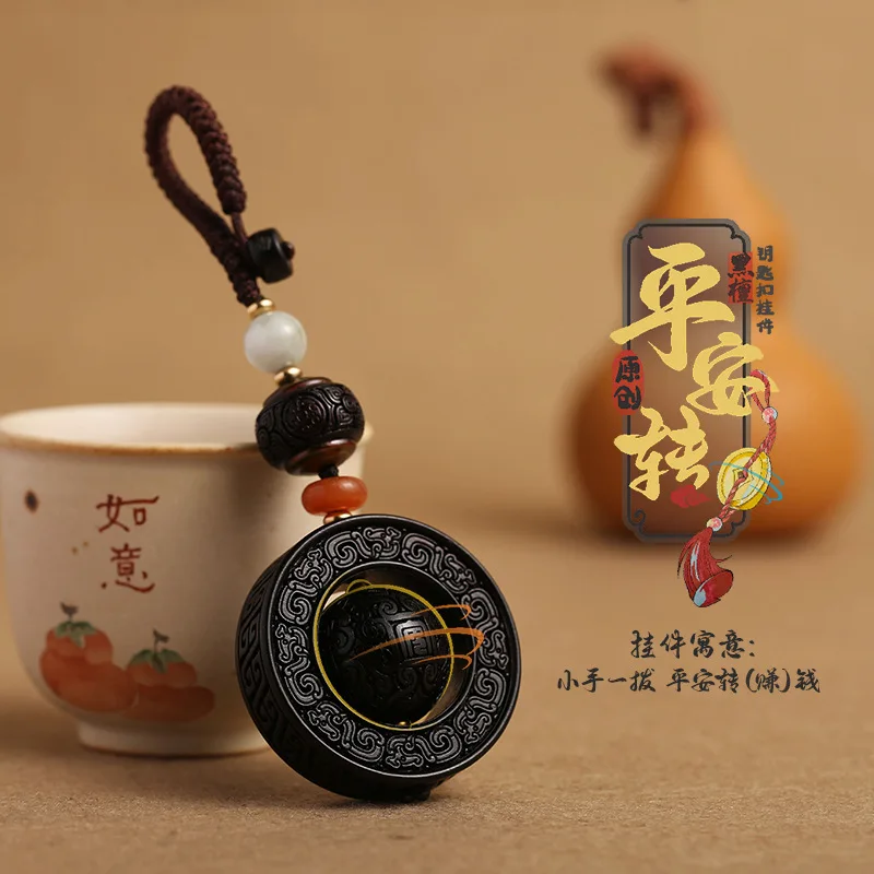 

Брелок с подвеской из бусин из черного сандалового дерева