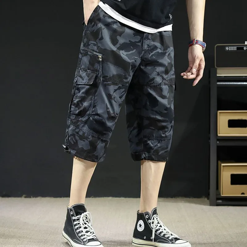 

Summer Men's Casual Overalls Fashion Solid Color Multi-pocket Zipper Loose Military Combat Camouflage Cropped Trousers.