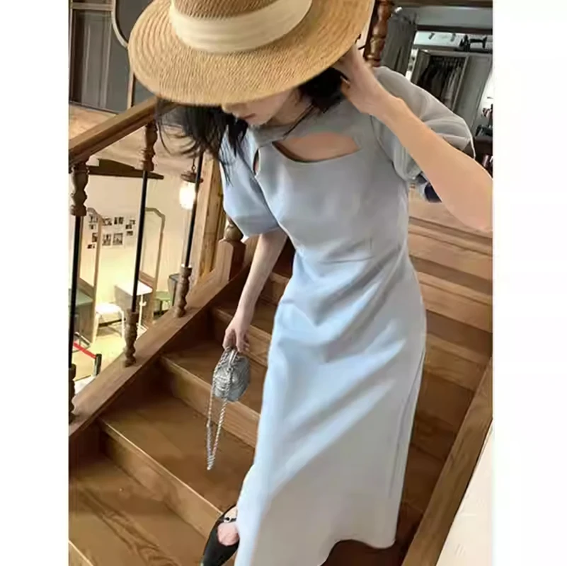 Abiti a trapezio dal design scavato estivo da donna Abito francese a maniche corte di grandi dimensioni Moda dimagrante Vestibilità nuovo stile Tinta unita
