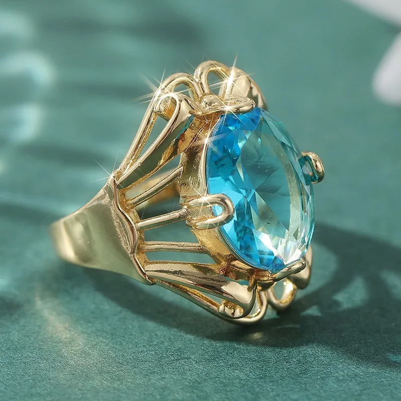 Wunderschöner Eingelegter Meerblauer CZ Damenring Trendiger Goldfarbener Handgravierter Hohler Alltags- und Partyschmuck Jubiläumsgeschenk – Detail 4