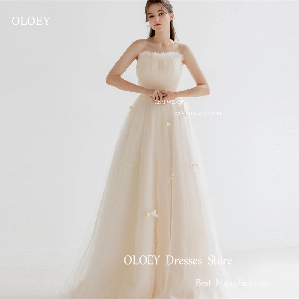 Oloey-おとぎ話の結婚式のドレス,台形のドレス,ストラップレスのブライダルガウン,結び目,床の長さ,庭,写真の撮影,カスタムメイド