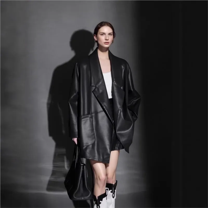 A new mid-length leather with cinched-waist suit style for women featuring windbreaker feel