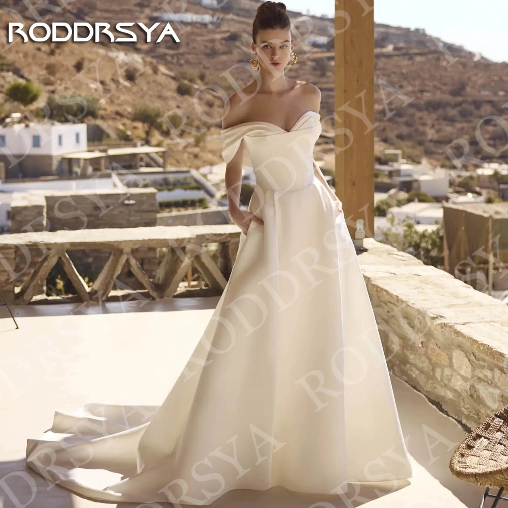 

RODDRSYA Beach Open Back Wedding Dress Satin Simple Off Shoulder A Line Bridal Dresses Sweetheart Neck Customized with Pockets