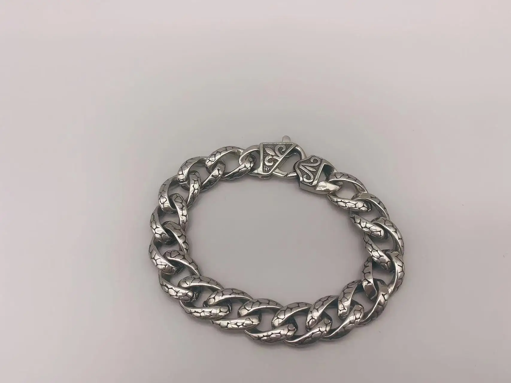 

Le Han Jewelry Silver Leopard Print Link Men Bracelet