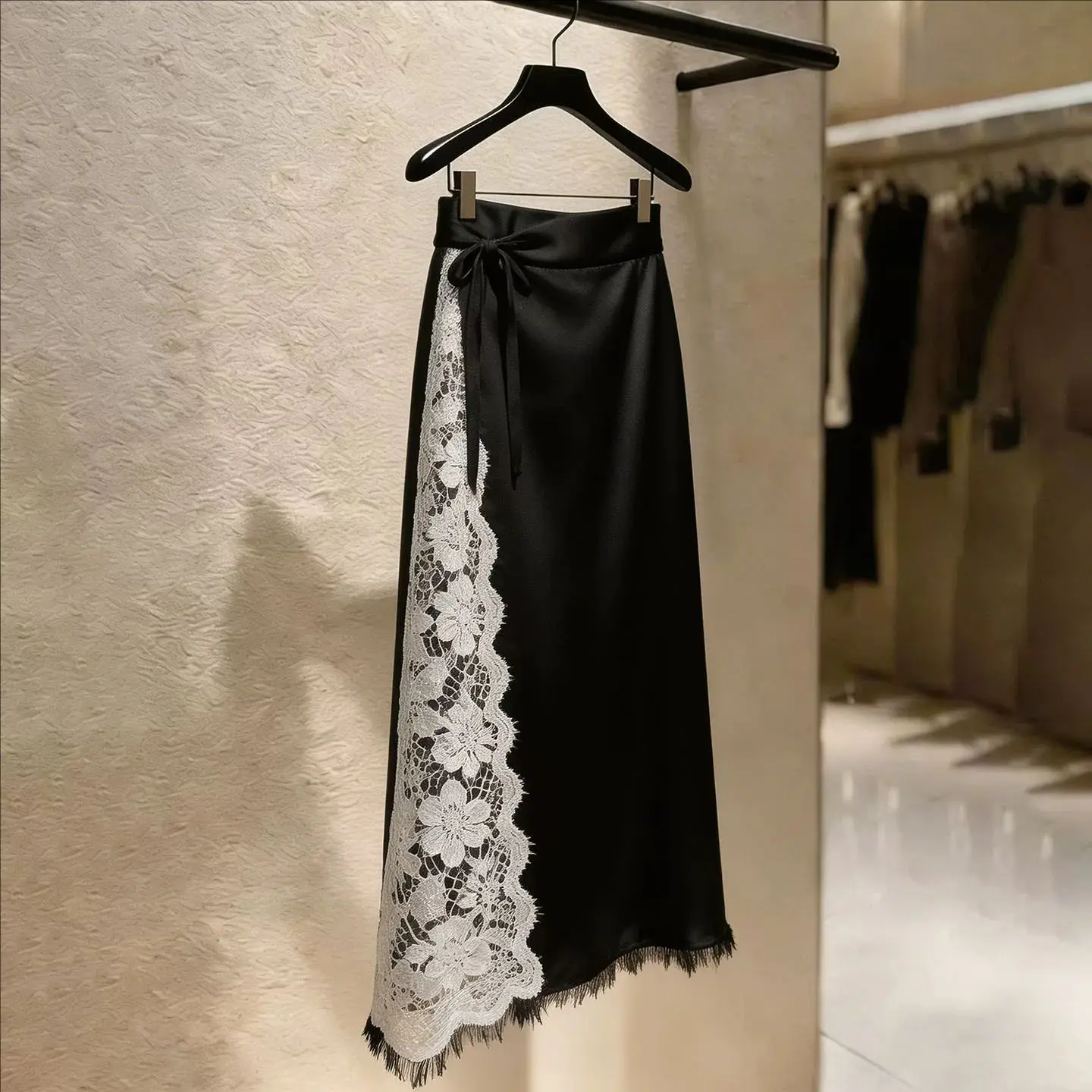 Black satin lace splicing design skirt women's summer 2026 popular new A-shaped skirt women clothing