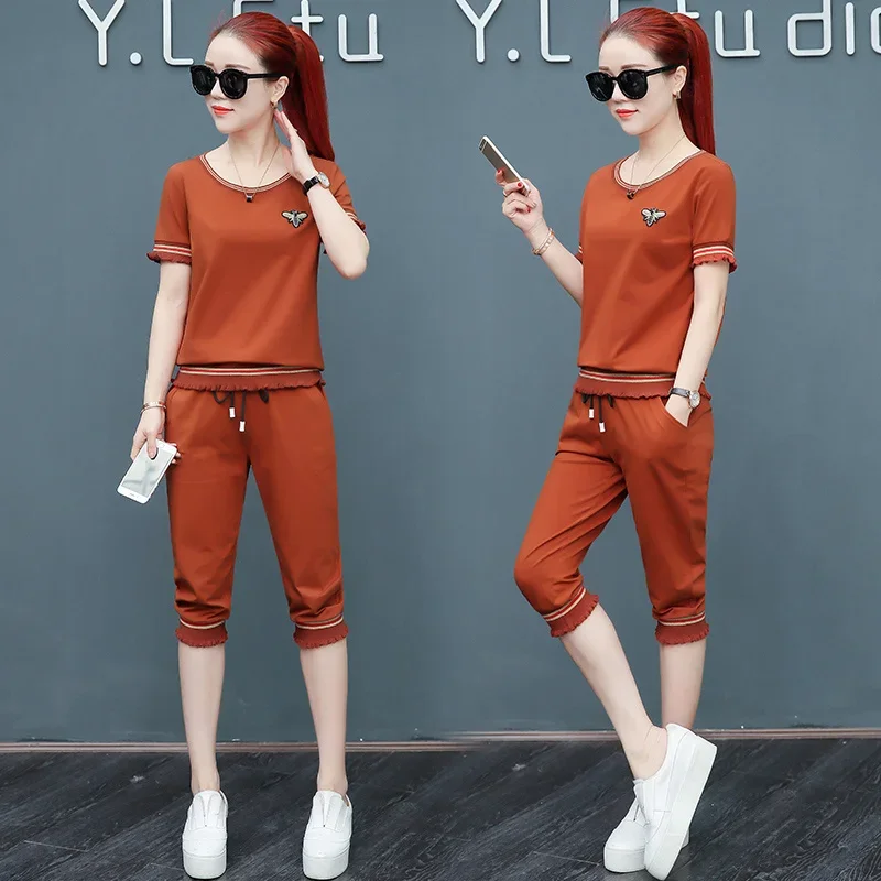 

Women's Casual Suit Korean Version suit 2025 Summer New Loose Short Sleeve Tops And Capris 2 Two Piece Sets Fashion Sportswear