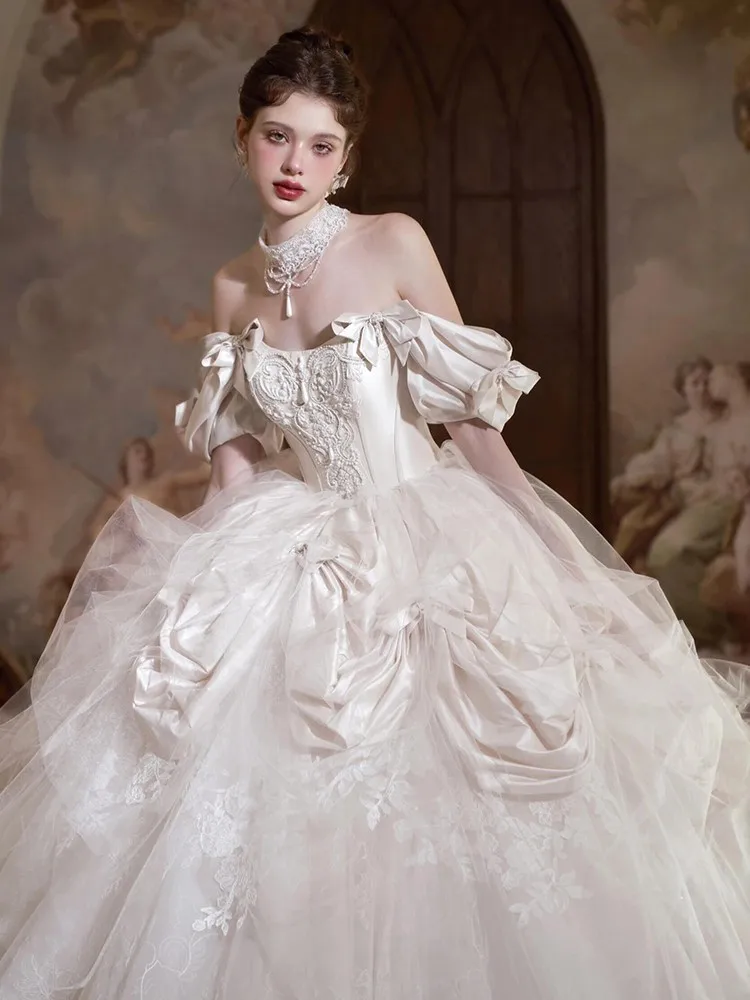 A new satin dress for people to wear featuring chiffon and heavy one-shoulder design