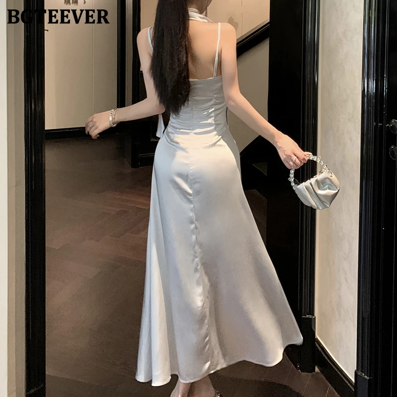 BGTEEVER printemps été élégant dames Spaghetti sangle paquet hanche robe en Satin élégant femmes fendu sans manches robe moulante