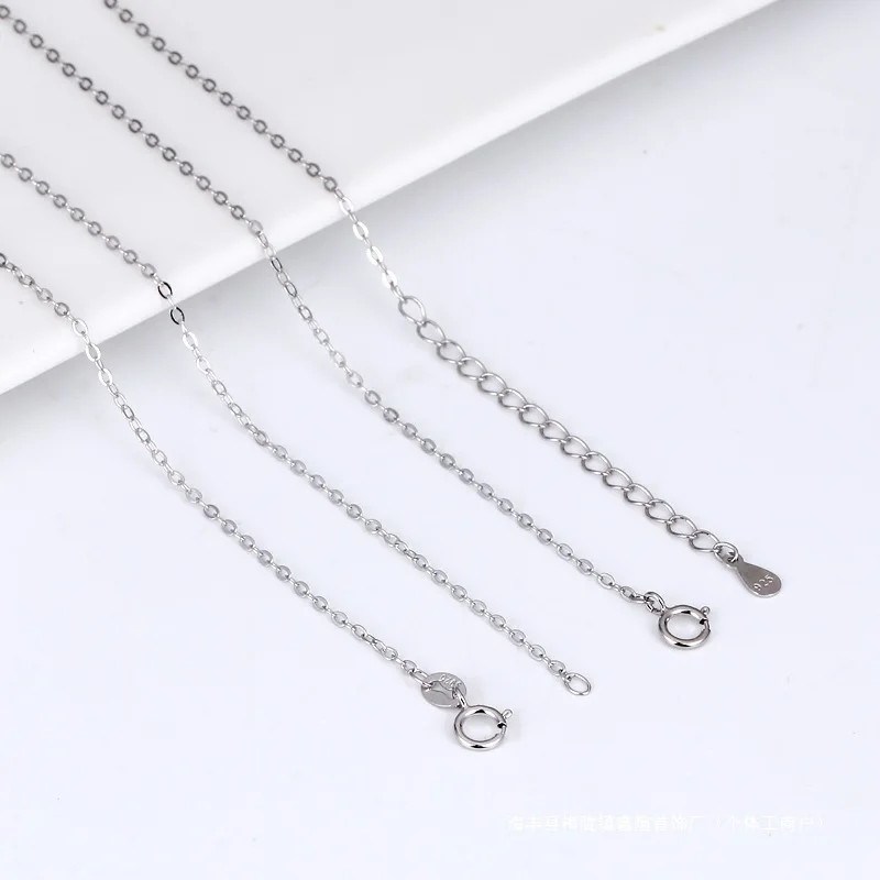 Sterling silver cross chain necklace for adults, slender flexible design with smooth spring clasp, meteor shower inspired light
