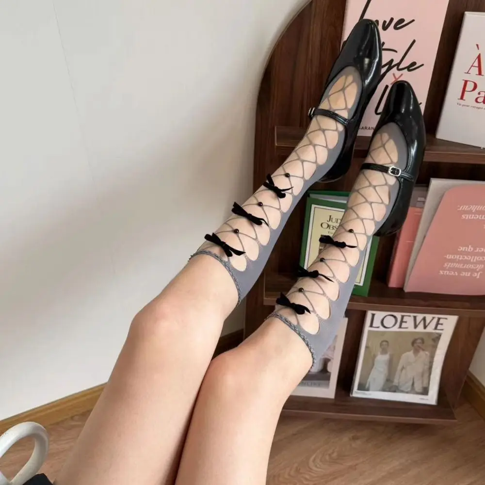 الألفية الإبداعية JK الدانتيل متابعة جوارب الجوف خارج فتاة حار نمط الدانتيل Bowknot جوارب شبكة صيد السمك منتصف جوارب أنبوبية الإناث