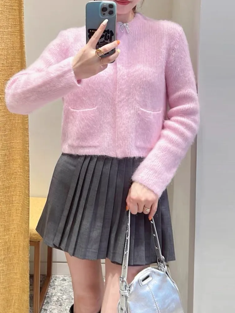 High-End-Version Europäische Sle gestrickte lange Sve-Knoten verzierte Diamant-Damenoberteil rosa offene Strickjacke