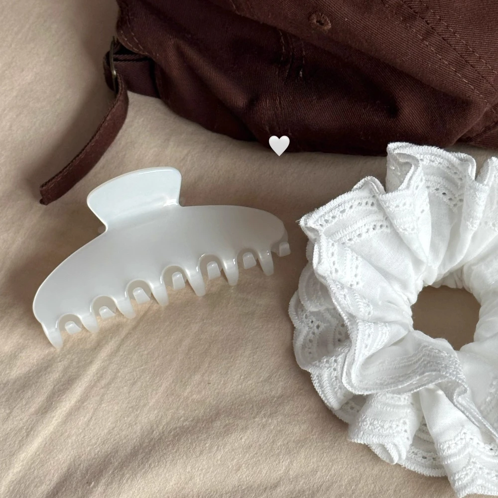 

Trending Pearl White Hair Claw Clips Large Aesthetic Hair Claws for Women Girls Strong Hold Minimalist Hair Accessories