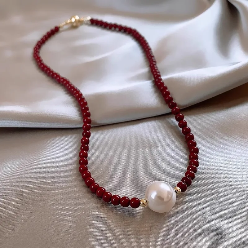 

Glass Pearl Light Luxury Ankela Red Beaded Pearl Necklace Female Ball Magnetic Buckle Design Sense Niche Clavicle Chain