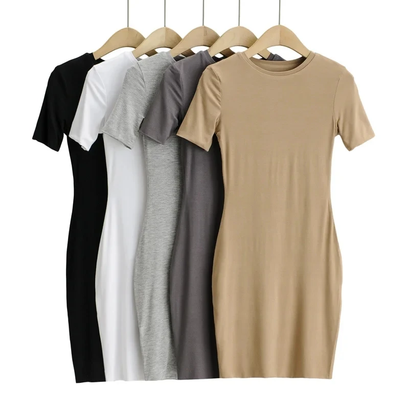 Vestido justo de manga curta com gola redonda e dupla camada, estilo streetwear, em malha de aodão, peça única com saia em ...