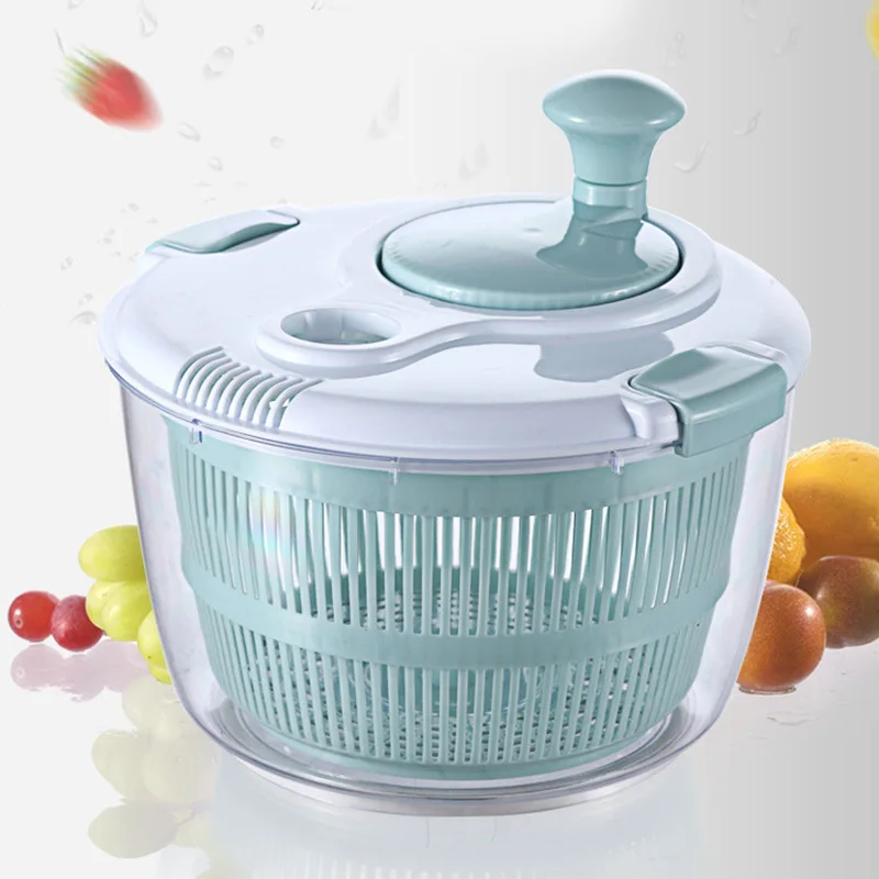 Manual kitchen spinner for fresh produce drying, compact plastic basin with ergonomic crank handle, efficient water removal from