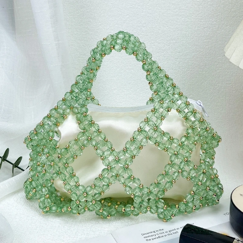 

Handmade Transparent Crystal Acrylic Beaded Handbag Hand-woven Beads Hollow Out Design Summer Small Size Mobile Phone Bag 2026