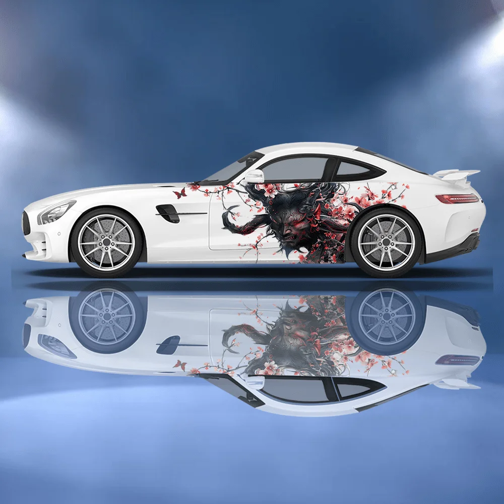 

Person wearing a demon mask surrounded by flowers and branches; car sticker; full body floral decoration covering scratches; wat
