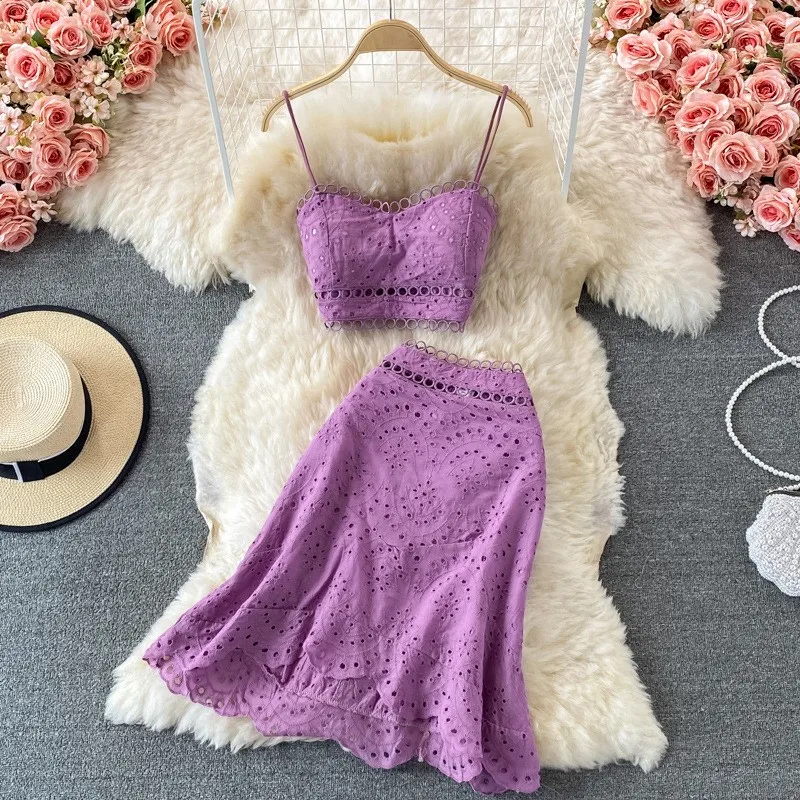 

2025 New Summer Women Slim Skirt Suits Solid Hollow Hole Sexy Camisole Crop Top And High Waist Mini Skirt Two Piece Set