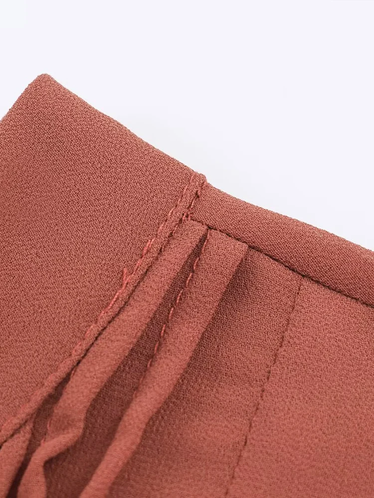 New European-style women's dress, fashionable and versatile, featuring an elegant design with ruffled details and long sleeves.