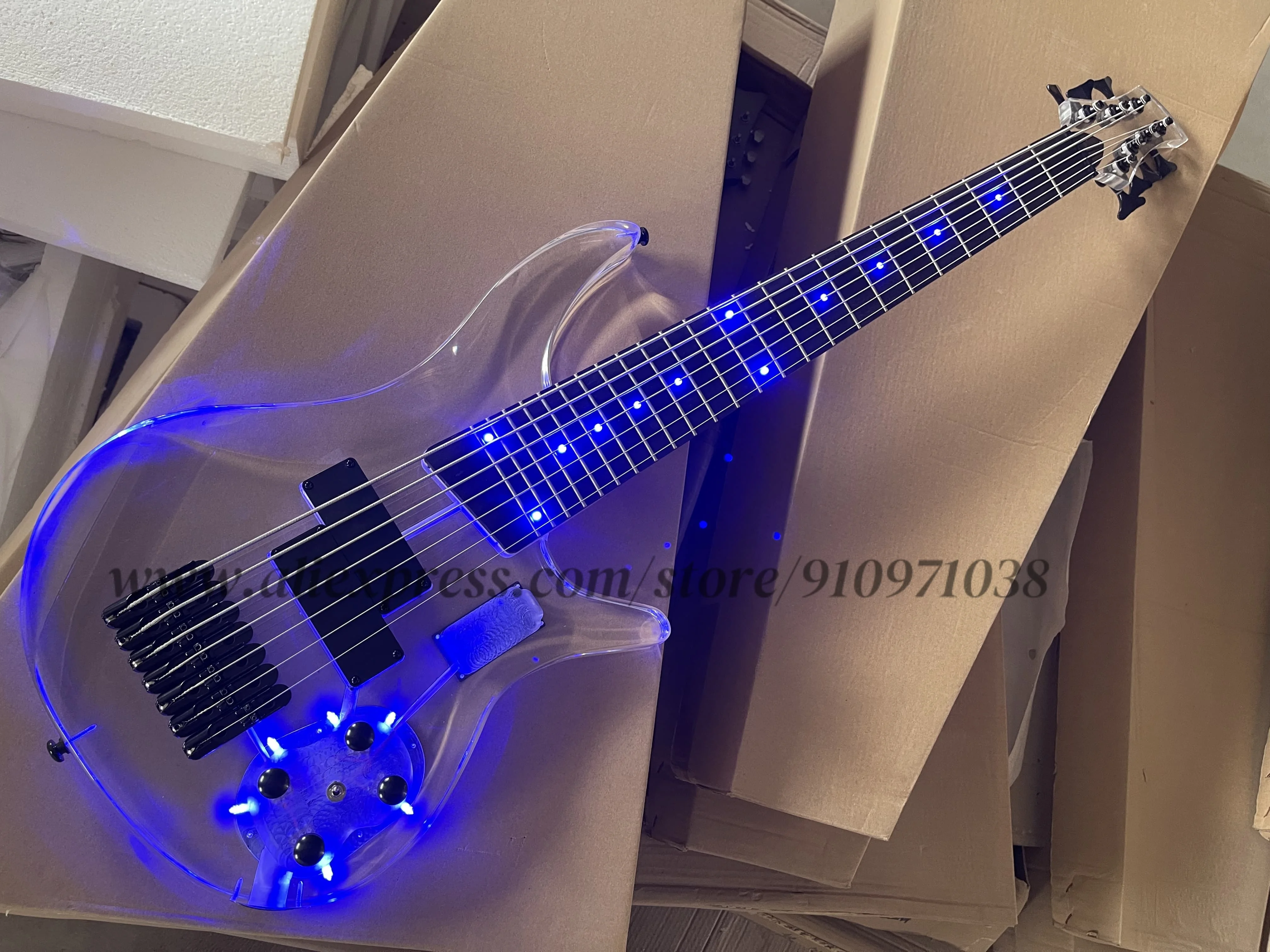 

Classic 7 string bass, acrylic body, blue LED lights, rosewood fingerboard blue LED lights inlaid, maple neck, fixed bridge