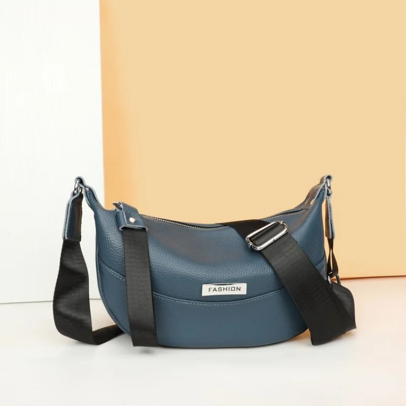 

Luxury Brand Inspired Crossbody Bag With Monogram Pattern And Leather Trim For Iconic Fashion Statement