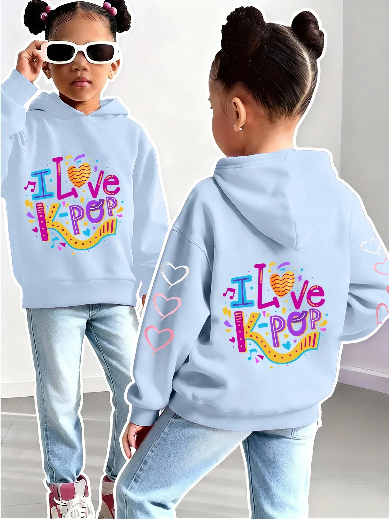 A Vibrant Tribute to Korean Music And FashionThis Hooded Sweatshirt Features Adorable Cartoon Prints