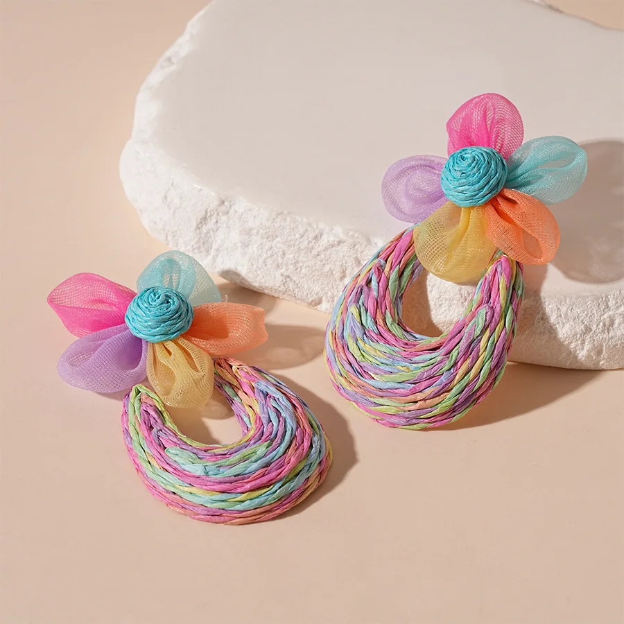Early spring hand-woven lace flower raffia U-shaped steel needle earrings, girlish temperament high-end earrings women