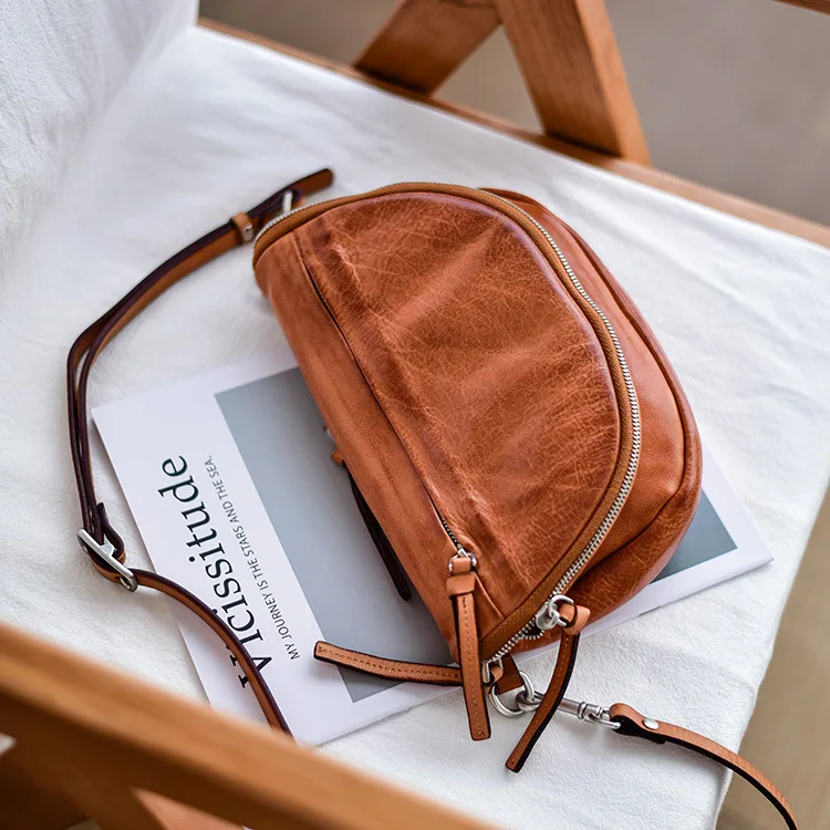 

Top-grain Cowhide Women's 2026 Pure Leather Saddle Bag Casual and Versatile Chest Bag, Leather Crossbody Designer Luxury Bag