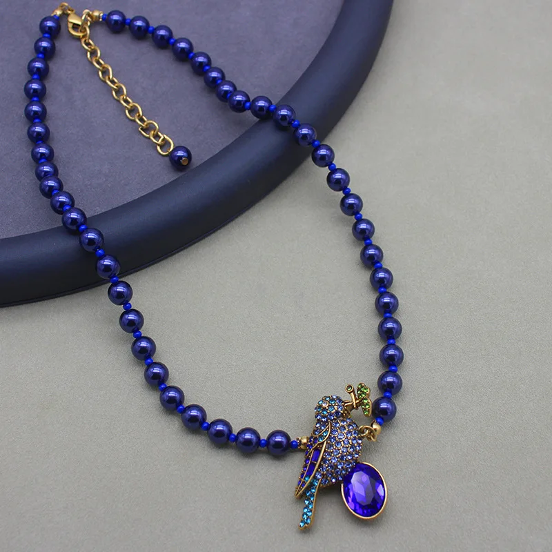 Set of Magpie Necklace, Earrings, and Brooch - Premium Blue Glass Pearl with Antique Gold Plating view 4