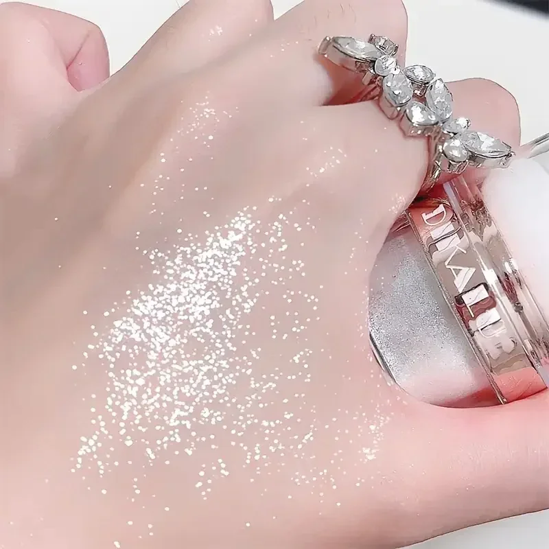Sparkling Fairy Powder Highlighter - Rozświetlający puderek do konturowania i różu dla rozjaśnienia i definiowania twarzy, tworzący efekt błyszczący.