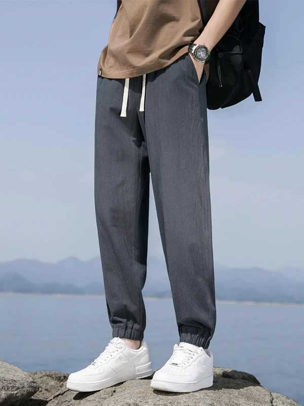 

Мужские летние тонкие повседневные брюки свободного кроя из хлопка и льна, удобные, дышащие, с эластичной талией, в стиле харлан