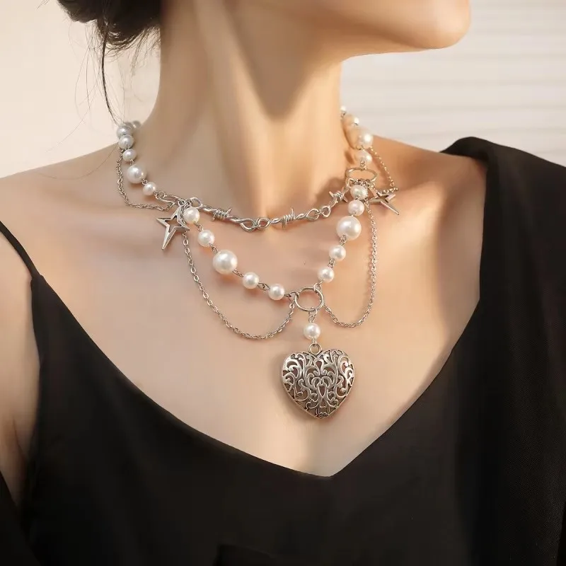 High-end sense of multi-layer imitation pearl four-pointed star tassel love pendant necklace fashion temperament ladies accessor