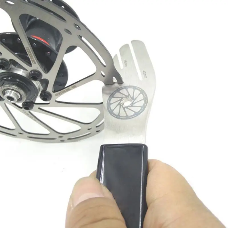 จักรยานโรเตอร์ True การจัดตำแหน่ง Truing ส้อมสแตนเลสจักรยานเบรค Disc Rotor Truing Tool Adjuster TruingWrench Correction