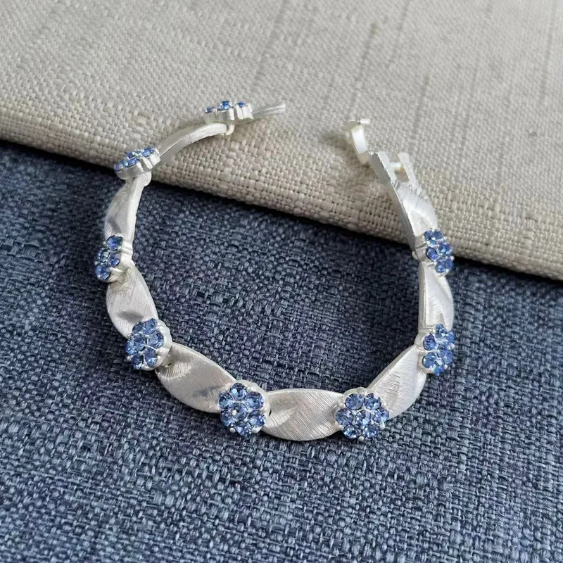 

Fashion Jewelry Matte Bracelet with Colorful Crystal Birthstone Pendant Satin Ribbon and Geometric Charm Design
