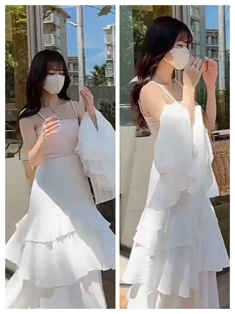 2023 frühling Sommer Neue Frauen Hohe Taille Dünne Lange Rock Mode Süße Unregelmäßige Rüschen Split Saum Kuchen Rock