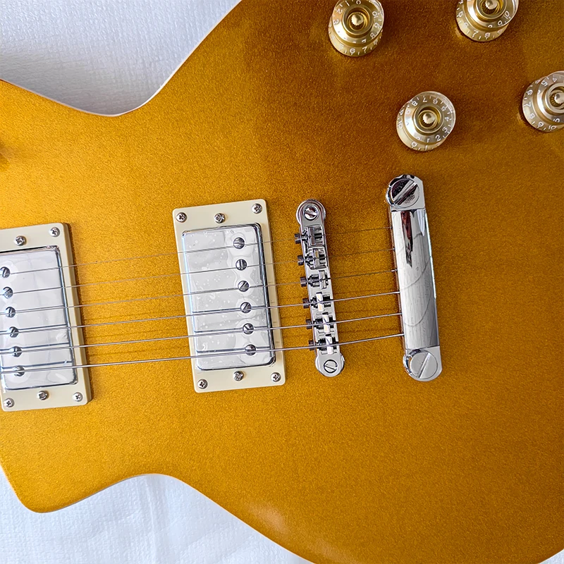 Ship from Local Warehouse, Shipped Within 2 Business Days. Amber Gold Solid Body Electric Guitar, Dual Humbuckers, 6-String Electric Guitar. Vintage and Unique Styling, Ideal for Beginner Practice and Heavy Metal Rock Stage Performance.