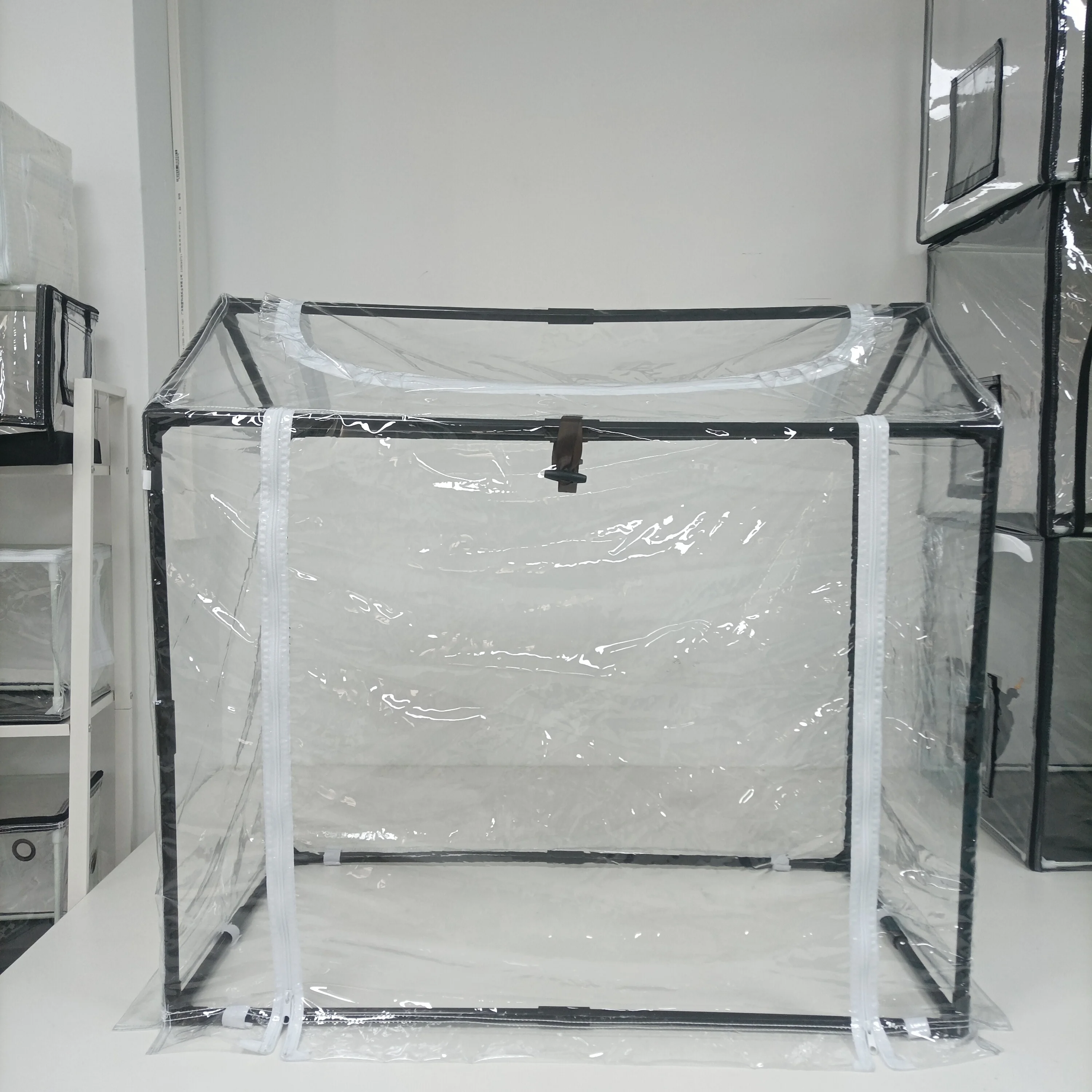 Portable mini greenhouse made of high-density polyethylene, with roll-up zippered windows to help plants thrive