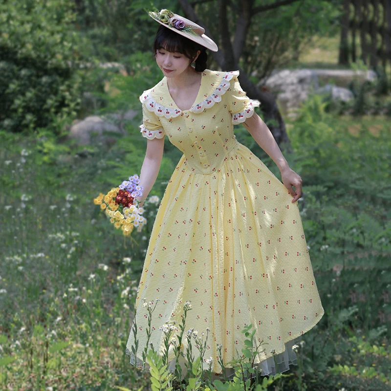 AnXin SH Vintage Prinzessin gelbe Baumwolle Kirschdruck Blumenspitze V-Ausschnitt Kurzarm Knopf Reißverschluss individuelles Abendkleid