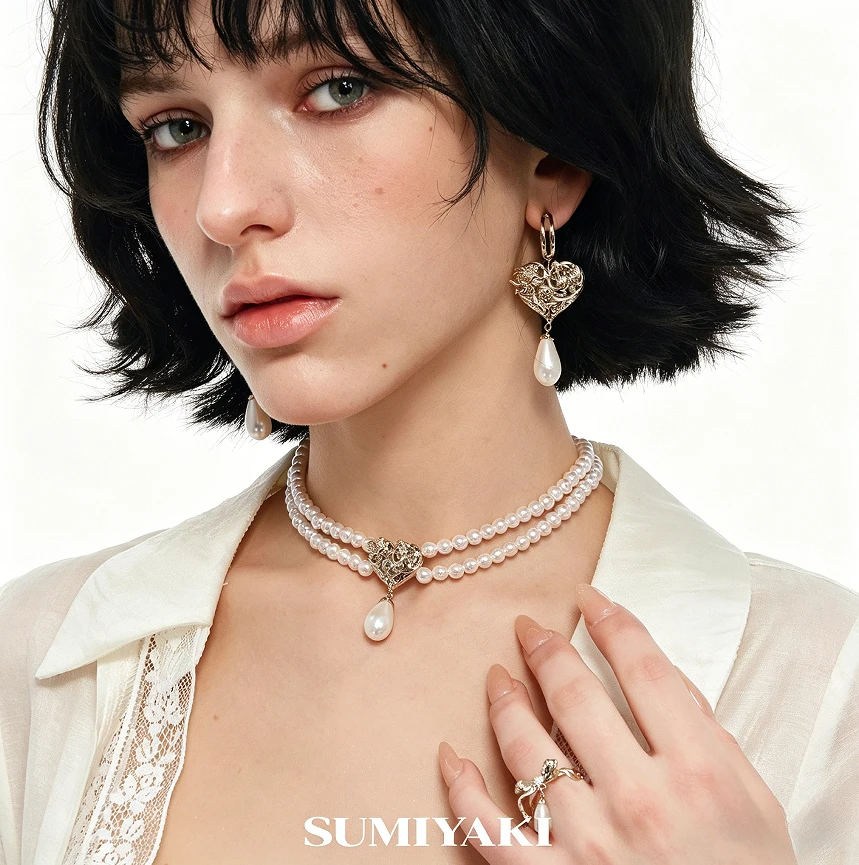 

Genuine SUMIYAKI Angel Love Double-Sided Embossed Pearl Clavicle Chain, Double Sided Rotating Earrings Set