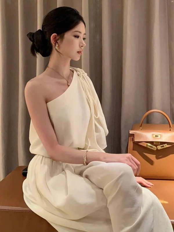 

Elegant Slim Fit Sleeveless Fashion Top And Wide Leg Pants Set Women's Summer 2025 Shoulder Baring Two Piece Ensemble