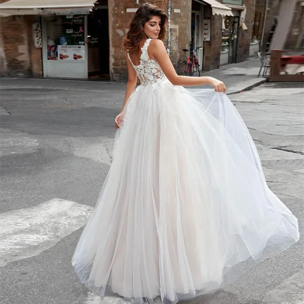 Deep V-Neck Classic Wedding Dresses For Bride Sleeveless Garden A-Line Tulle Attractive Covered Buttons Backless Applique 2024