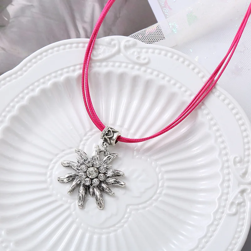 Edelweiss floral pendant necklace for women featuring heart-shaped rhinestone-embellished alloy charm on delicate snake bone cha