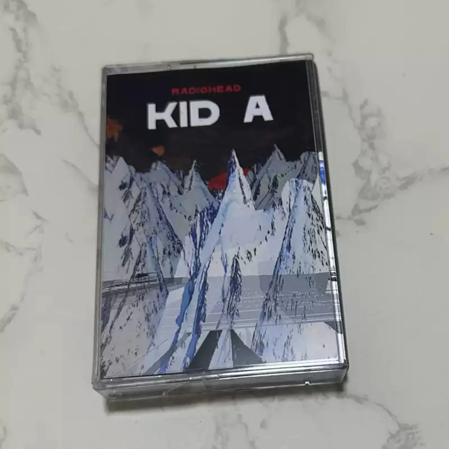 

Kid A Cassette Tape, Atmospheric Experimental & Alternative Rock with Avant-Garde Arrangements Retro Format