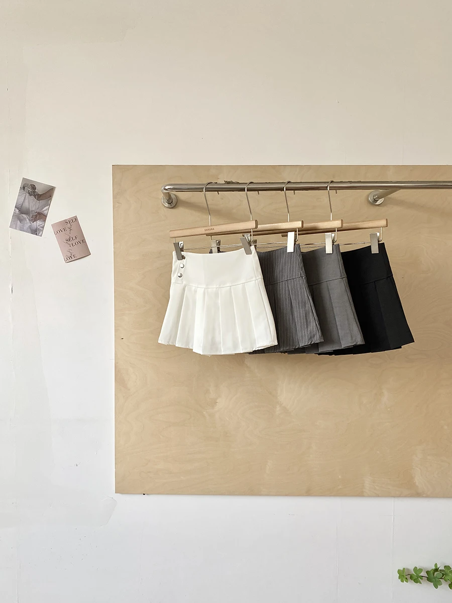 

Весна 2026: Модная короткая юбка с высокой талией, простой дизайн, корейский стиль, для офиса, из полиэстера, двухцветная, средней длины.