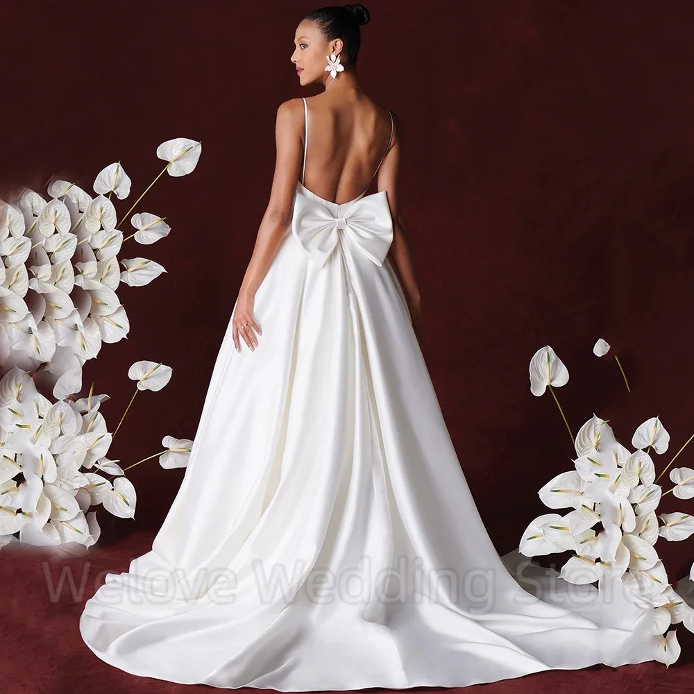 Sexy Open Back A-Line Bridal Wedding Dress Spaghetti Straps Sleeveless with Bow Floor Length Sweep Train Custom Made Gowns