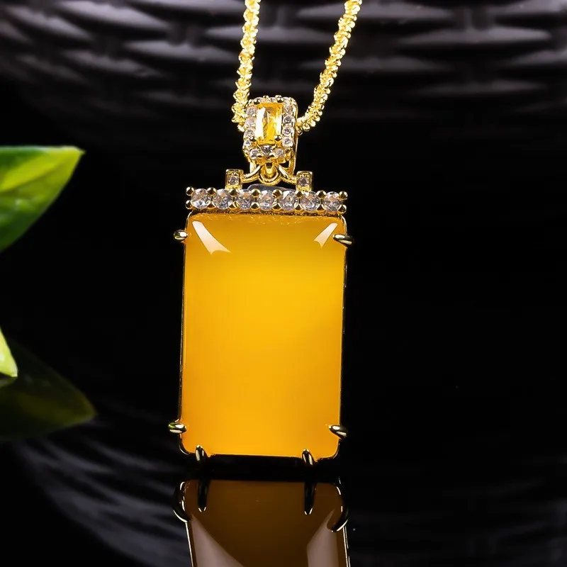 Authentic, fully yellow chalcedony-inlaid pendant with a "peace and safety" charm, designed as a couple's necklace accessory view 4
