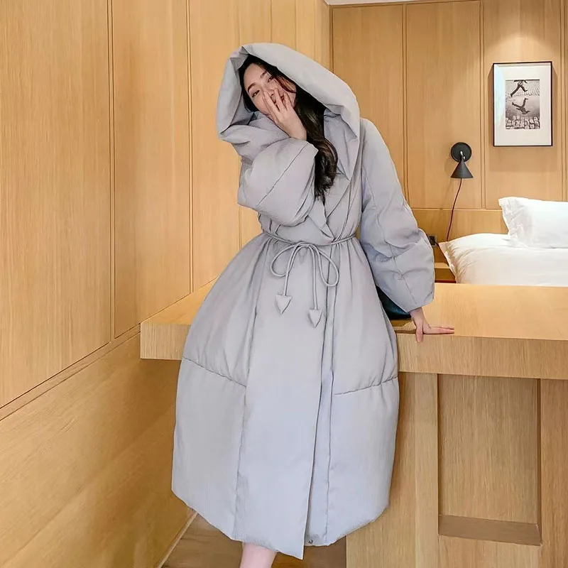 Moda nova engrossar 90 pato branco para baixo casaco 2026 inverno feminino na altura do joelho solto rendas até capuz à prova de vento quente parkas casacos femininos