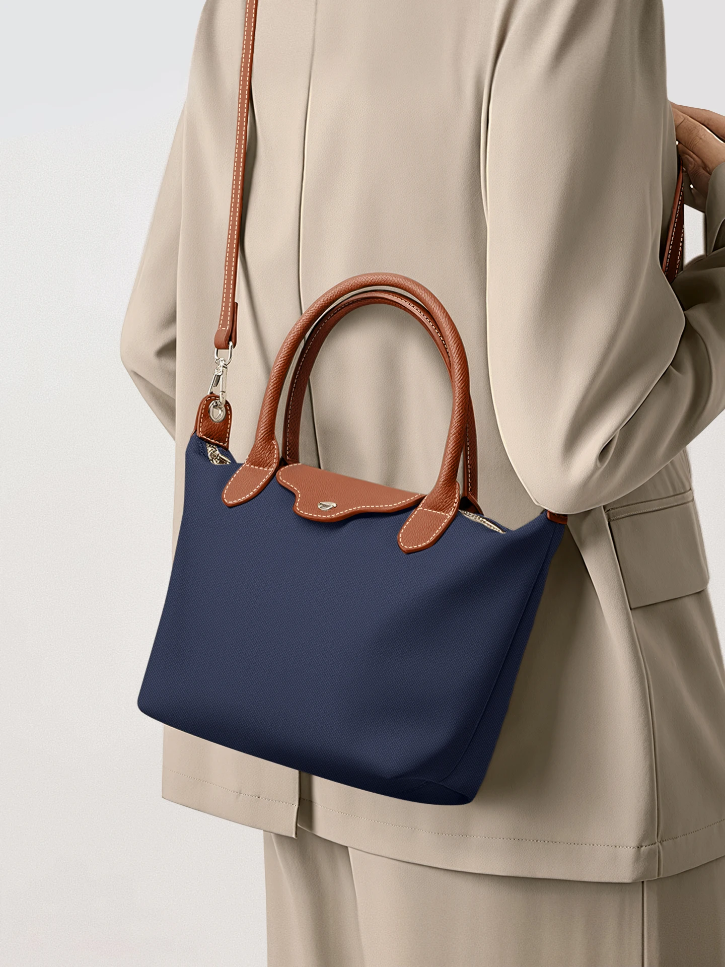 

Musician Ox Cloth Dumpling aped Crossbody Bag Retro Handheld Women's Commuter Small Tote Lightweight Versatile Bag