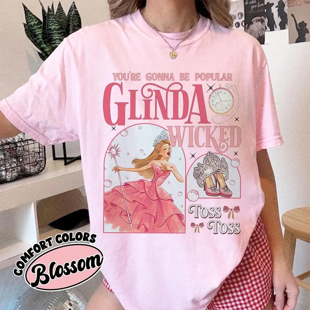 قميص Glinda The Good Wicked Comfort Colors تي شيرت برسومات برودواي الموسيقية تي شيرت مستوحى من شعبية رمي علوي