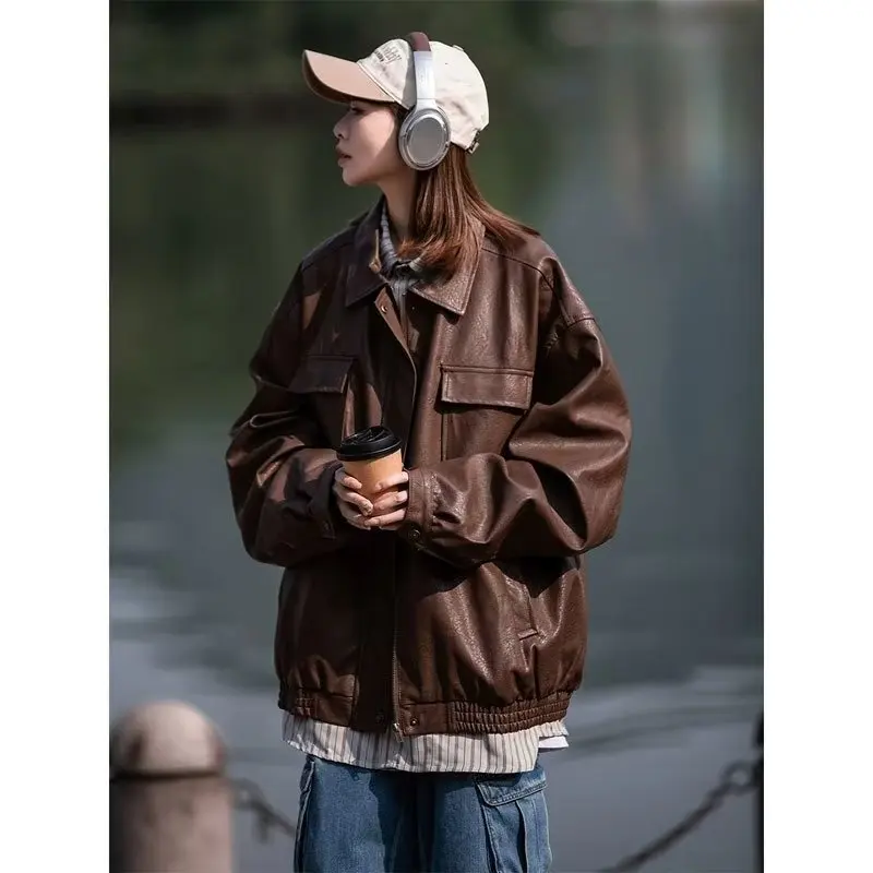 Giacca in pelle PU uomo donna Multi-tasca Baggy risvolto cappotto Cargo Street Vintage moto giacca a vento primavera Casual Bomber top